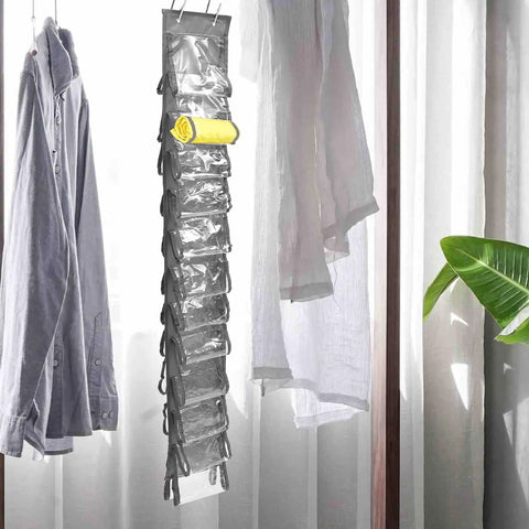 Double Sided Hanging Clothes Organizer Bag Keeps Your Closet Hella Tidy And Super Easy To Grab What You Need For Daily Storage And Simple Home Organization Vibes That Make Your Space Game Strong, grey organizer with pockets, mounted on a rod.