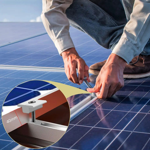 Man installing Heavy Duty Solar Panel Center Clamps Knockout Grip for 40mm photovoltaic rails on solar panels.