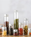30ml Clear Glass Vials With Secure Aluminum Screw Caps Including Gaskets Set of 30 Airtight Leakproof Spice Bottles, filled with assorted herbs.