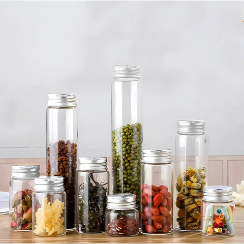 30ml Clear Glass Vials With Secure Aluminum Screw Caps Including Gaskets Set of 30 Airtight Leakproof Spice Bottles, filled with assorted herbs.