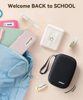 D110 Bluetooth Label Maker With Thermal Printer shown with labeled school supplies and carrying case, ideal for home office use.