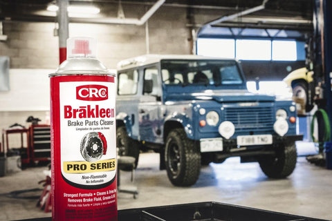 Front view of CRC Brakleen brake parts cleaner spray can, 29 oz, Pro Series, red/white label in automotive shop.