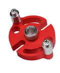 Red aluminum alloy self centering doweling jig for woodworking and furniture assembly, with 3 stainless steel drill bushings visible