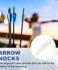 Beefy 4.2mm Arrow Nocks 30 Pack White Insert Nocks Replacement shown next to bows in background, ideal for hunting and archery