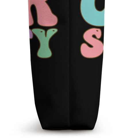 Slick Cyber Security Tote Bag Built Tough With Heavy Duty Canvas And Reinforced Strap Handles, showing colorful lettering on a black fabric.