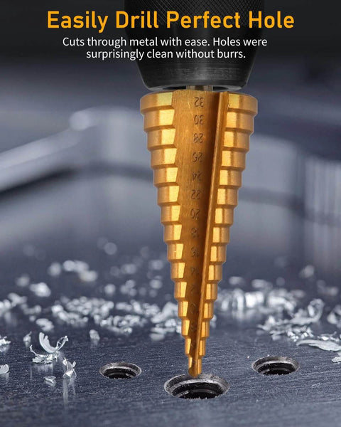 Gold woodworking stepped drill bit close-up with size markings, drilling into a dark work surface.