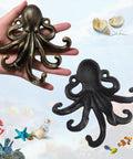 Tough As Nails 2 Pack Octopus Wall Hooks Heavy Duty Cast Iron 5 Arm Design shown together in antique bronze and black finishes.