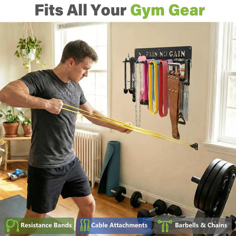 Person using resistance bands next to 8 Hook Wall Mount Home Gym Organizer Rack For Barbells Resistance Bands Jump Ropes Foam Rollers Belts And More Garage Grade Heavy Duty Gear Storage Solution With All Hardware Included.