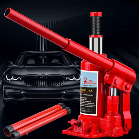 Heavy Duty Top Shelf Rock Solid Two Ton Hydraulic Bottle Jack Smooth Manual Car Lift For Garage And Shop with accessories in red.