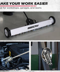 36 Inch Rolling Magnetic Sweeper With 40 Inch Telescoping Magnetic Pickup Tool in workshop setting, collecting metal debris.