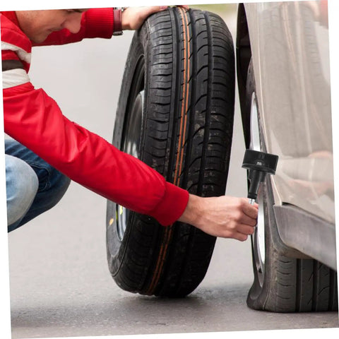 Man installing tire with Spare Tire Hold Down Bolt Retainer Clamp For Cars And SUVs No Brainer Install And Easy Removal Rugged Tire Bolt Retainer