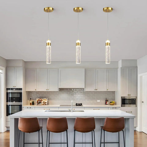 Gold Crystal Pendant Light For Kitchen Island, 4000K LED Modern Adjustable Chandelier in a stylish kitchen setting.