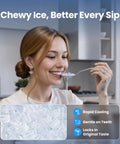 Countertop nugget ice maker in stainless steel; woman tasting ice with spoon; ice cubes visible.