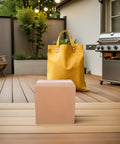 Brown Corrugated Cardboard Boxes 15x15x15cm Cube Shipping Boxes 15 Pack on a wooden patio with outdoor grill and yellow bag