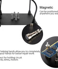 Helping Hands Soldering Clamp Station with 6X LED Magnifying Lamp and magnetic PCB holders on black base.