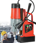 Highly Portable Magnetic Drill Press With 1350W Motor And 16mm Boring For Precise Metal Wood Tapping, close-up with worker adjusting settings.