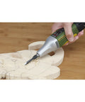 Person using Heavy Duty Die Cast Aluminum Power Carver With Fiberglass Reinforced Polyamide Housing And Precision Gearbox on wood carving