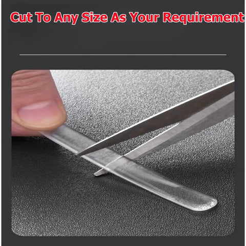 Cutting Extra Long Silencer Pads 20 Pack For Soft Close And No Slams Ultra Quiet Dampers to size with scissors, close-up view