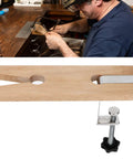 Wooden Jewelers Bench Pin with Heavy Duty C Clamp for ring polishing, shown on a workbench in a jewelry studio.
