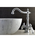 KS1491WLL Sleek Wilshire Vessel Sink Faucet Polished Chrome With Deck Mount next to a marble vessel sink on vanity deck