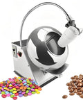 Top Shelf Stainless Steel Sugar Coating And Drying Machine Kicks Butt For Candy Polishing with colorful candies beside it.