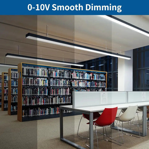 Eight Foot LED Linear Shop Light with 100W Draw and 10000 Lumen Output Adjustable Color Temperature 3000K 4000K 5000K Bay Lighting Fixture for Office Workshop Gym Market Flush Mount Suspended ETL Certified Pack of Four installed in a library setting