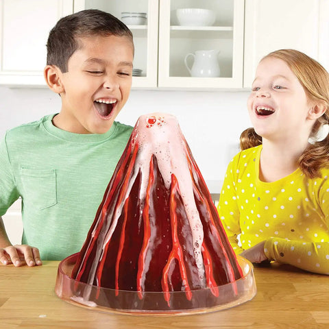 Children engaged with Hands On Erupting Cross Section Volcano Model For Kids 6 To 10 STEM Projects Back To School Classroom Experiments Realistic 11 Inch Volcano Interior Revealing Magma Chamber And Vents With Safe Eruption Materials For Teachers