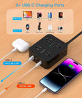Slick Flat Power Strip Surge Protector With Eight Wide Outlets And Four Fast Charge Usb Ports For Gaming Rig Home Office shows USB ports charging devices.