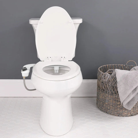 White toilet with SlimEdge Non Electric Bidet Attachment For Toilet With Dual Front And Rear Nozzles Cold Water Wash installed