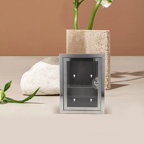 Locking Wall Mounted Stainless Steel Storage Box With Double Layer Design, See Through Door, front view in a home setting