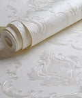 Cream White Damask Decorative Textured Floral Wallpaper Non Woven Wall Covering For Your Space And Home Vibe Not Peel And Stick Embossed Pattern With Drop Match And 25.2 Inch Repeat Needs Glue 20.8 By 393 Inches in a roll showing embossed details.