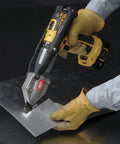 Turbo Shear Drill Attachment For 18 Gauge Automotive Metal Cutting in use with cordless drill, wide jaw cutting metal sheet.
