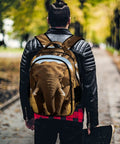 Unisex Elephant Print Backpack With Wilderness Design worn by person in park, showcasing large capacity and durable construction