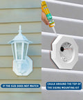 Vinyl Siding Mounting Block With Built-In Electrical Box For Outdoor Light Kit installed on siding, white, weatherproof.