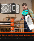 Image showing Air Filtration System For Woodworking With Built In Ionizer And 1350 CFM Hanging Dust Collector in workshop.