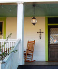 Outdoor Pendant Lights With Farmhouse Style Black Metal Hanging Porch Fixture And Clear Bubbled Glass Globe Inside An Iron Cage Frame For Rustic Vibe Exterior Lantern For Gazebo Patio And Entryway on porch