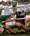 Teams in tug of war using strong rope, similar to All Natural Jute Rope 1 Inch By 48 Feet 4 Strand Twisted Hemp Rope for crafts.
