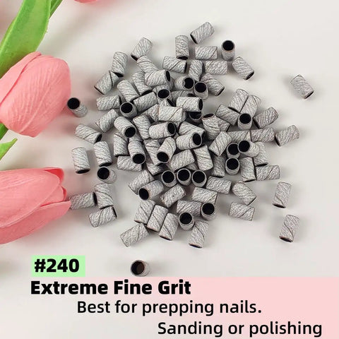 100 Pcs 240 Grit White Sanding Bands For Nail Drill Bit 0.31 In Diameter Extreme Fine Grit Sanding Belts displayed on table