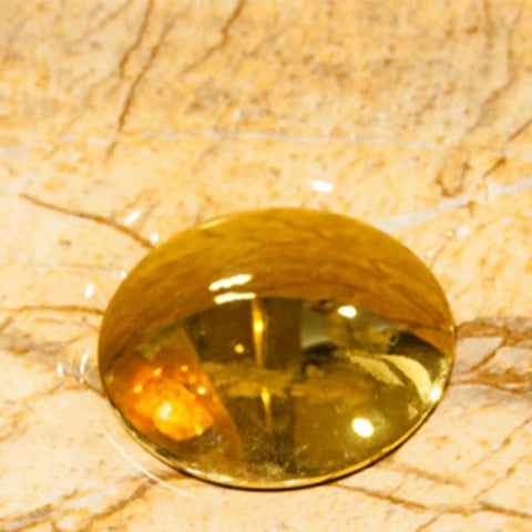 Water droplet on a countertop near a Ceramic Vessel Sink,16.5"x5.9"Round Vessel Sink Marbling Vessel Sink Bathroom Sinks.