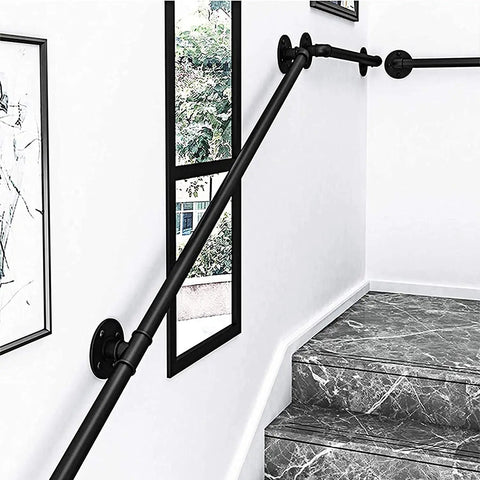 Sleek Black Wrought Iron Stair Rails With Super Grippy Non Slip Coating Zero Hassle Diy Wall Mount Setup Heavy Duty Indoor Outdoor Banister For Seniors Kids Hallway Loft And Bathroom 19 Feet Long installed on a stairway with black metal supports.