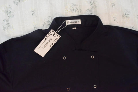 Mens Long Sleeve Chef Coat Breathable Kitchen Cooking Uniform With Smart Pockets And Easy Collar Built Damn Tough For The Line To Whip Up Meals In Style Durable Workwear No Fuss Culinary Gear That Slays All Day Long, navy coat with label and buttons.