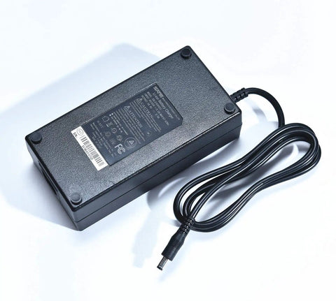 54.6V 2A Smart Charger For 48V Li Ion Ebike Battery With DC 2.1mm Jack, AC plug attached, black rectangular unit.