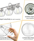 Three Light Bathroom Vanity Light In Brushed Nickel Finish With Clear Glass Shades Wall Sconce For Mirror And Hallway Built Tough With Iron Construction Durable And Humidity Ready Model WLA1435 BNK showing integral lamp body, bottom opening, universal mounting backplate, and thick glass shade.