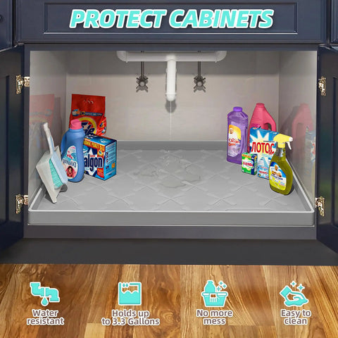 Under Sink Mat Waterproof 34 By 22 Inches Thick Silicone Kitchen Cabinet Liner And Drawer Protector installed with cleaning products.