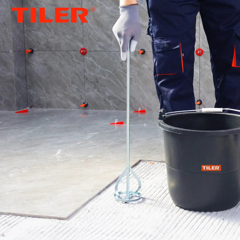 Person using Paint And Mud Mixer For Drill In 1 To 5 Gallon Buckets Paint Stirrer Attachment Fits All Standard Drills Zinc Plated Steel Hex Head