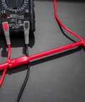 Automotive Multimeter Test Leads Kit with Wire Piercing Clips and 4mm Banana Plugs for Electrical Diagnosis shown in use