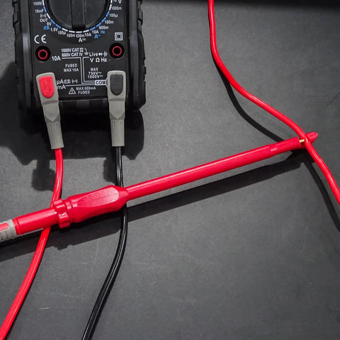 Automotive Multimeter Test Leads Kit with Wire Piercing Clips and 4mm Banana Plugs for Electrical Diagnosis shown in use