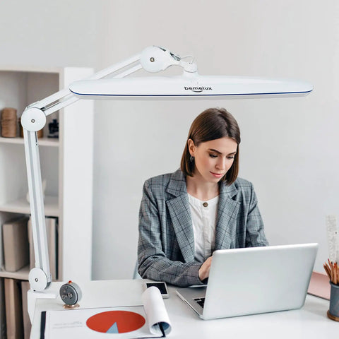 Task Lamp With Clamp For Desk Or Workbench 23 Inch Wide Head 117 LEDs 24W 2200 Lumen Dimmable Swing Arm Light used by woman