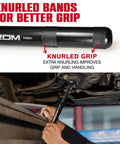 Close-up of knurled grip on Extendable Telescoping Pry Bar With Adjustable Indexing Positions That Give Straight Up Heavy Duty Leverage To Kick Rusted Bolts Free In Cramped Spots A Badass Shop Tool Every Pro Wants For Zero Sweat Pulling Power On Tough Jobs Daily.