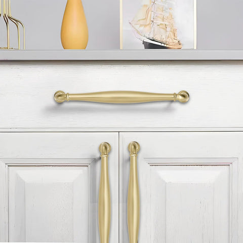 10 Pack 5 Inch Center Hole Champagne Bronze Cabinet Pulls Solid Heavy Duty Traditional Handles For Bathroom Dressers Drawers And Cabinets Durable Metal Hardware For Home Office Renovations And Modern Kitchens installed on white cabinetry.